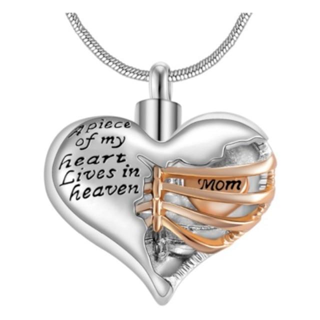 Heart in Chest Cage inscribed "A piece of my heart lives in Heaven" Urn Pendant for cremation ashes - Urn Of Memories